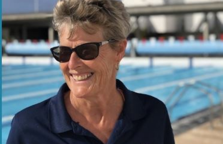Rose Jones posing for a picture next to a pool at Club La Santa Lanzarote.